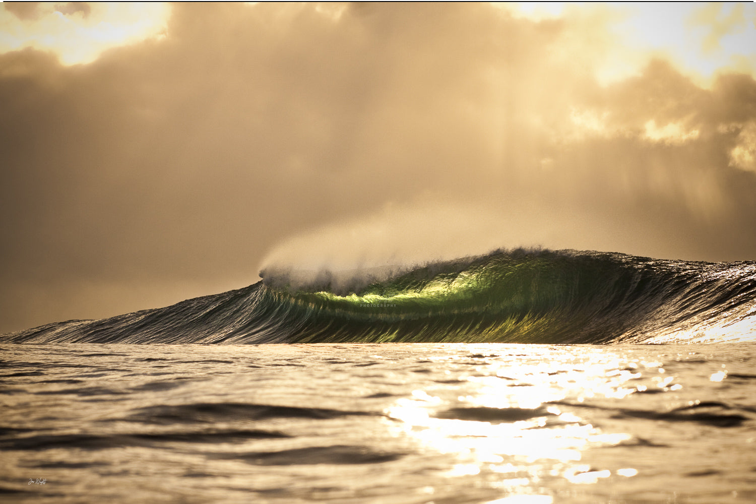 A golden lit wave curling under warm light rays, a glassy green toned barrel at sunset, surf art print.