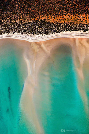 Red and Turquoise aerial abstract image of ocean