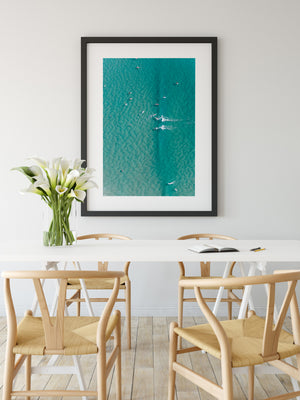 Gold Coast Beach Print black frame in room