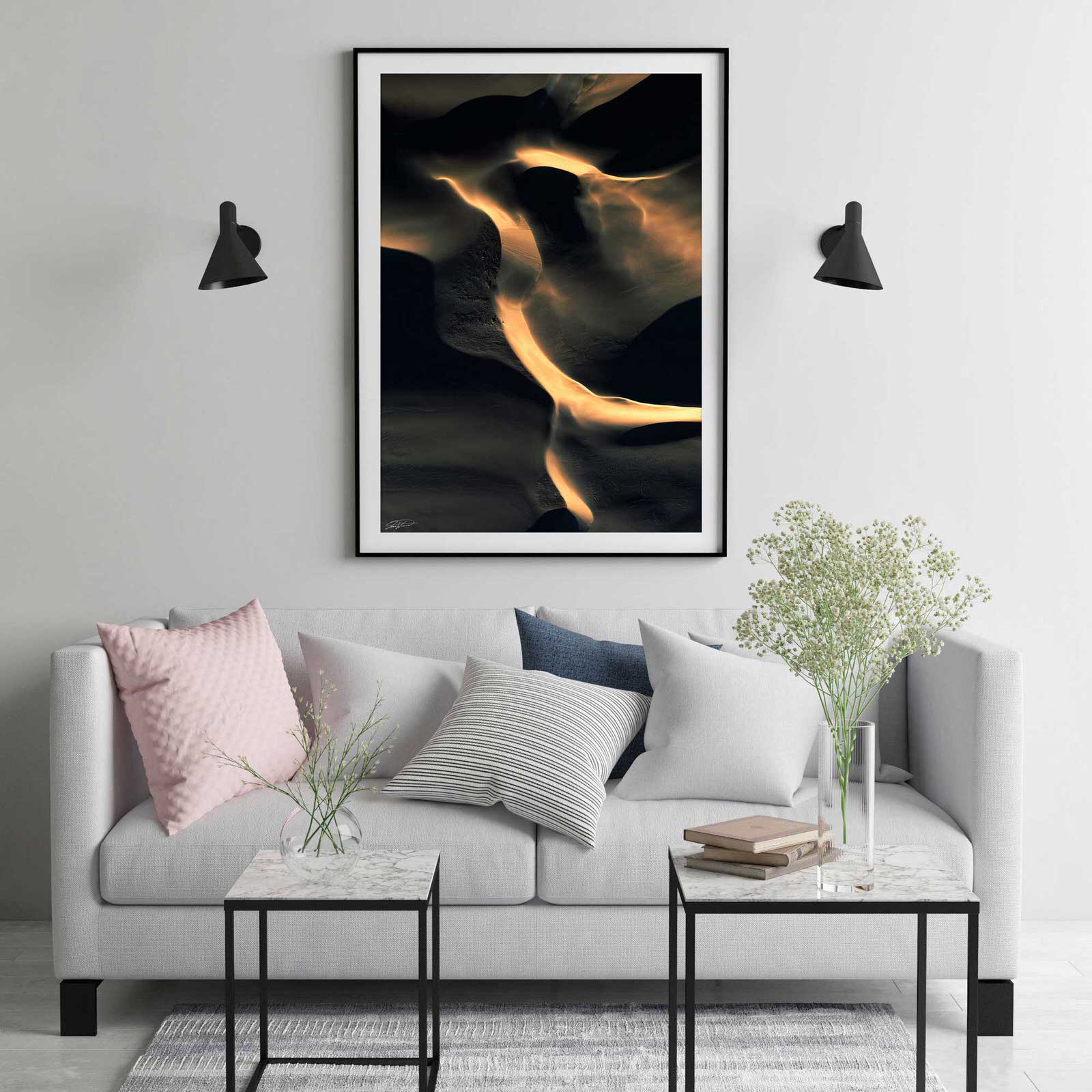 black and gold abstract wall art and print on wall with contemporary styling