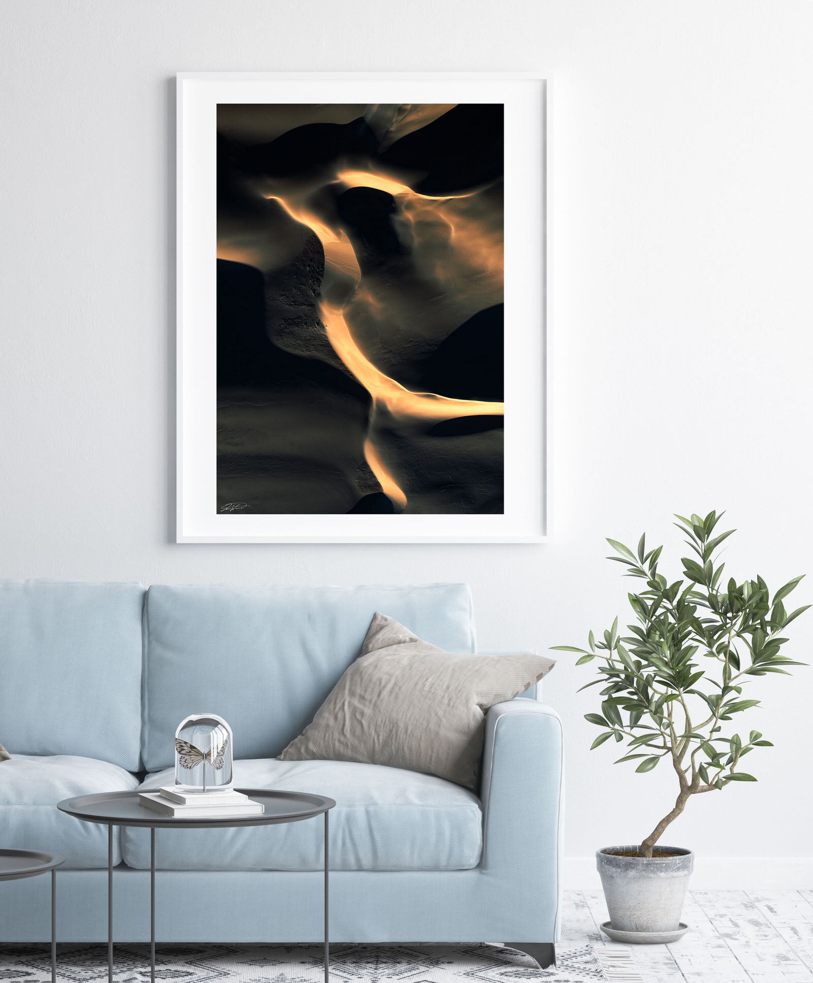 black and gold abstract wall art and print on wall with contemporary styling