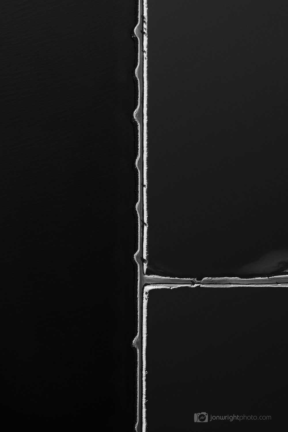 Abstract black and white print of road