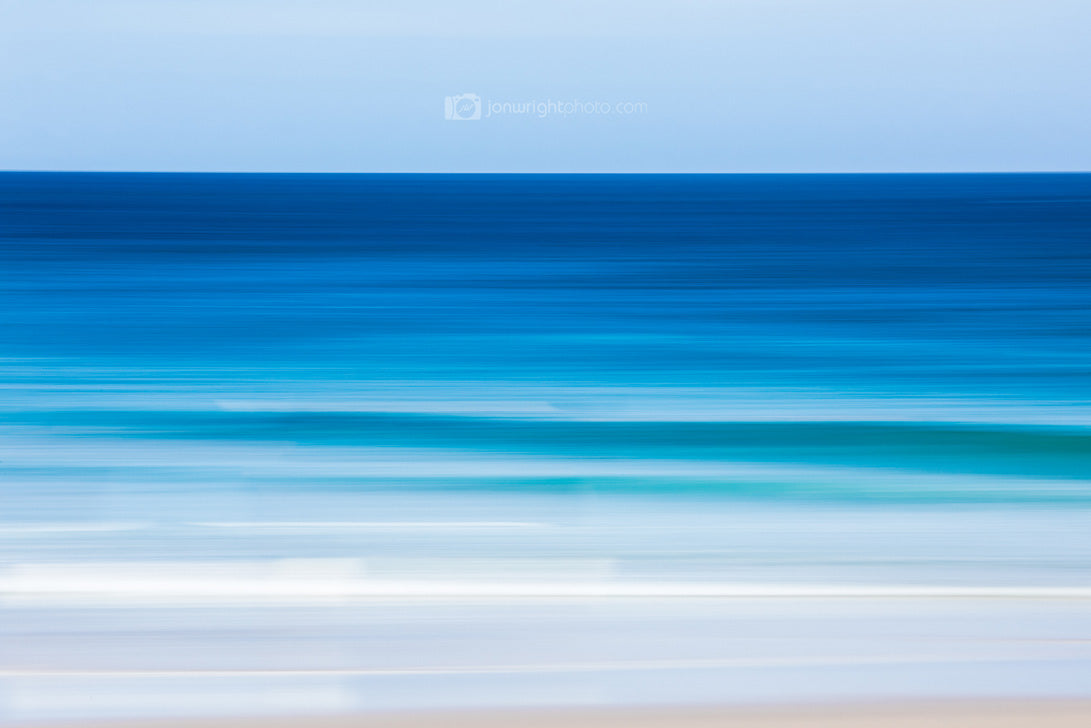 Revitalize beach abstract print with blue and white textured look