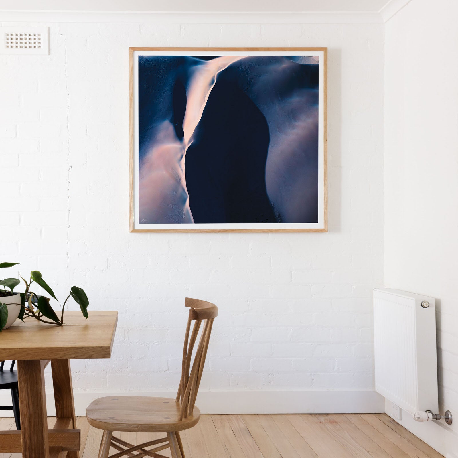 Purple abstract wall art in a square shape of sand dunes