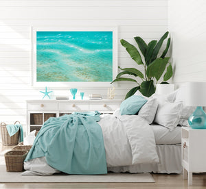 White Framed wall art with beach print in the middle