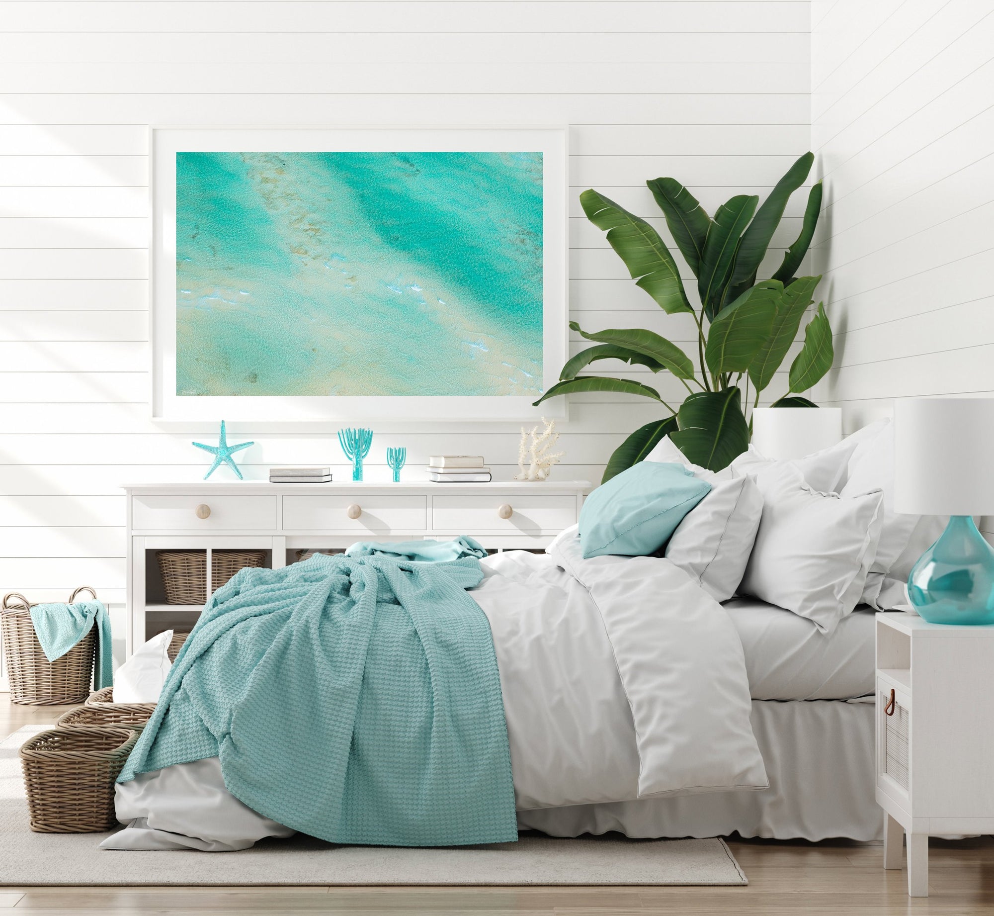 White framed wall art with turquoise aerial beach print