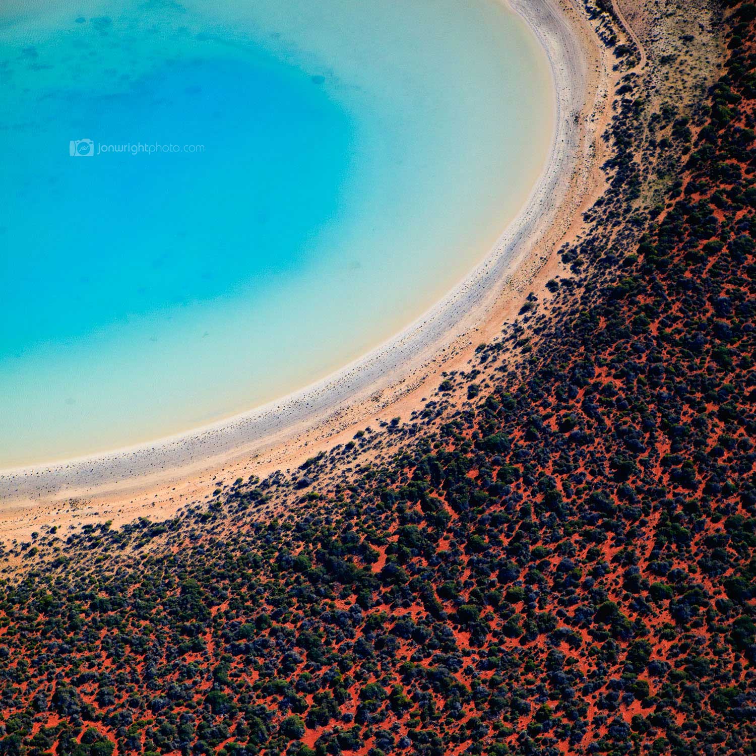 Square beach print western Australia red sands and blue water