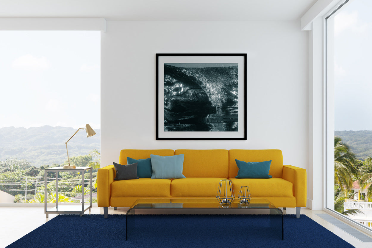 Black and white print in square black frame