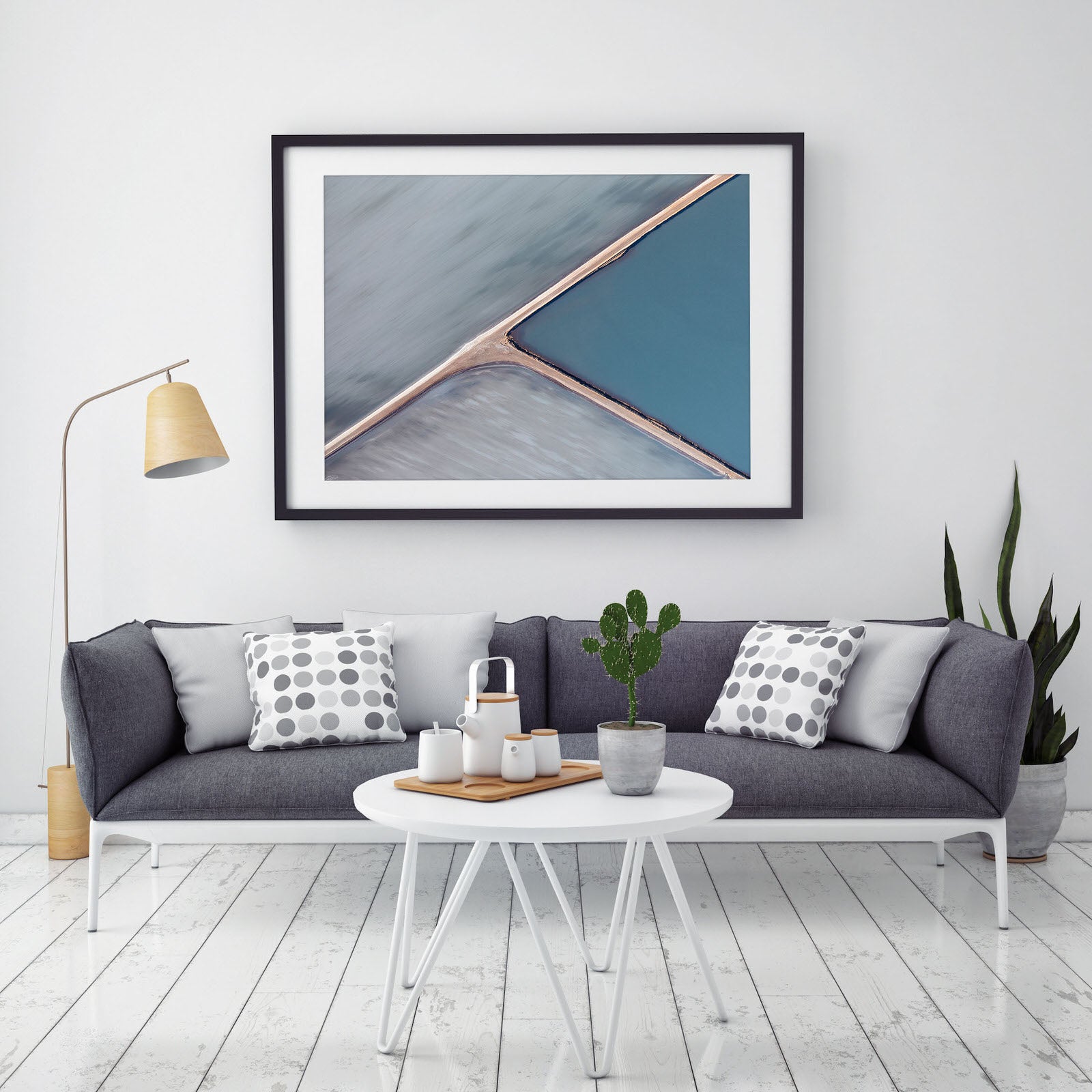abstract wall art with light blue and gray triangles