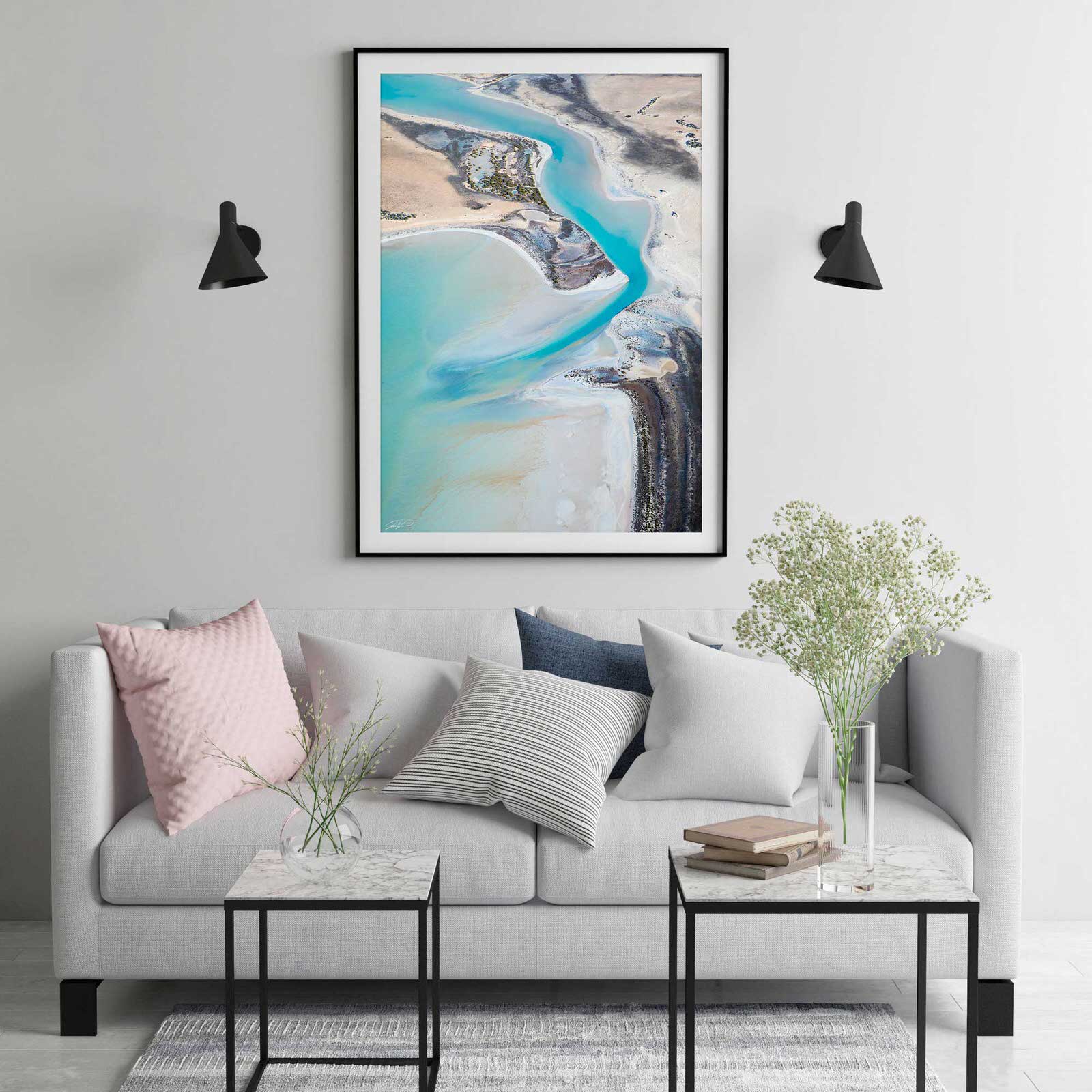 Pastel print and wall art in frame with modern living room