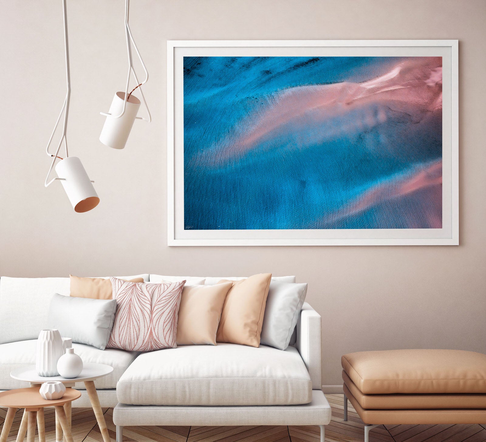 Contemporary interior with pastel colours and abstract art hanging on wall